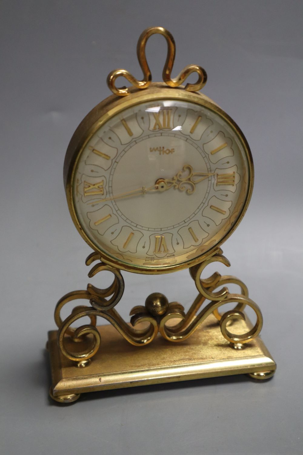 An Imhof vintage gilt brass small mantel clock,